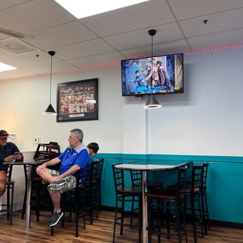 Love's Yogurt - a man and a woman sitting at a table - Desserts Near Me - Highland Park, Illinois Love's Yogurt - a man and a woman sitting at a table - Desserts Near Me - Highland Park, Illinois