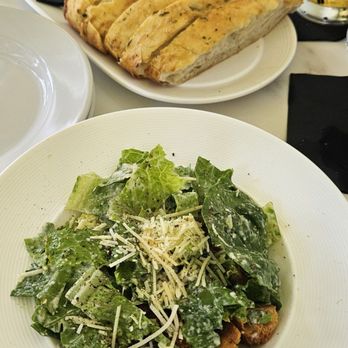 Blue Heron Kitchen and Bar - Caesar salad and bread. - New American Near Me - Camano, Washington Blue Heron Kitchen and Bar - Caesar salad and bread. - New American Near Me - Camano, Washington