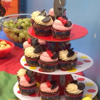 Cupprimo - Mickey and Minnie Mouse chocolate cupcakes with Vanilla or Strawberry Buttercream and fondant "ears" and "bows." - Coffee & Tea Near Me - Austin, Texas