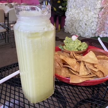 El Pueblito Patio - Agua Fresca (pepino?) and chips and Guacamole Dip - Mexican Near Me - Houston, Texas El Pueblito Patio - Agua Fresca (pepino?) and chips and Guacamole Dip - Mexican Near Me - Houston, Texas
