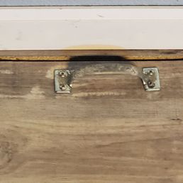 Hatch handle for crawl space with messed up screw