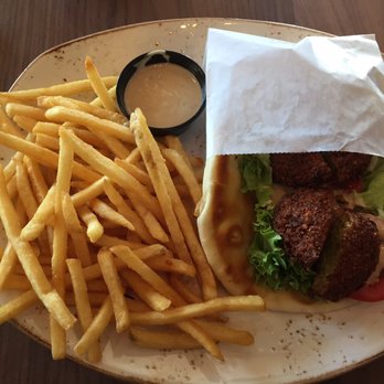 Luna Grill Richardson - Falafel pita wrap and fries. Yum!!! - Mediterranean Near Me - Richardson, Texas Luna Grill Richardson - Falafel pita wrap and fries. Yum!!! - Mediterranean Near Me - Richardson, Texas
