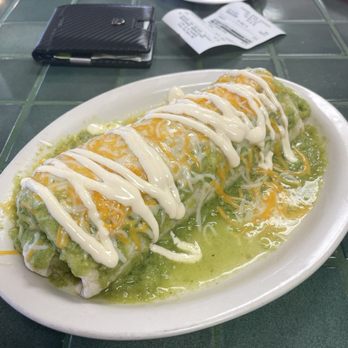 Tacos San Pedro - Wet carne asada burrito with salsa verde. Work of art - Mexican Near Me - Oklahoma City, Oklahoma Tacos San Pedro - Wet carne asada burrito with salsa verde. Work of art - Mexican Near Me - Oklahoma City, Oklahoma