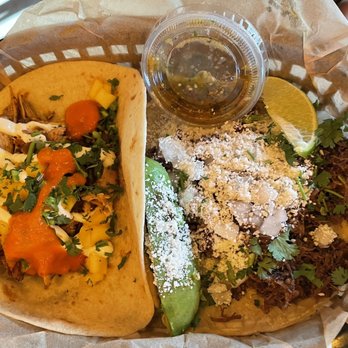 Torchy's Tacos - Brushfire taco (that's the really spicy jerk chicken one) and Democrat taco - Tacos Near Me - Phoenix, Arizona Torchy's Tacos - Brushfire taco (that's the really spicy jerk chicken one) and Democrat taco - Tacos Near Me - Phoenix, Arizona