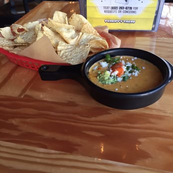 Torchy's Tacos - Chili con Queso with chips - Tex-Mex Near Me - Houston, Texas