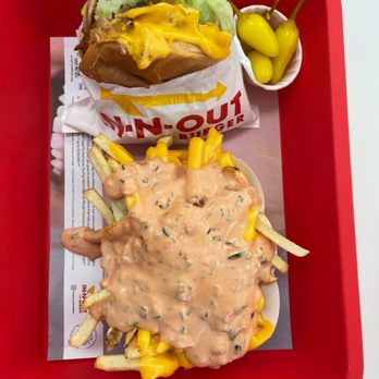 In-N-Out Burger - ows a red tray with fries and a cheeseburger - Burgers Near Me - Dallas, Texas In-N-Out Burger - ows a red tray with fries and a cheeseburger - Burgers Near Me - Dallas, Texas