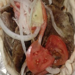 Original Gyro with tomatoes and onions, sauce on the side. Original Gyro with tomatoes and onions, sauce on the side.
