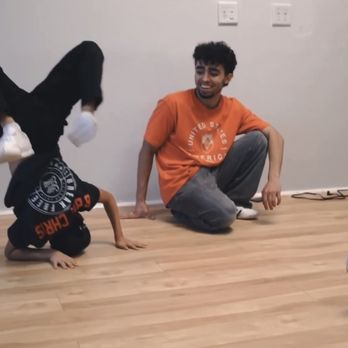 Winners Circle - Bboy Chris hitting a "freeze" in class. - Dance Studios Near Me - Galveston, Texas Winners Circle - Bboy Chris hitting a "freeze" in class. - Dance Studios Near Me - Galveston, Texas