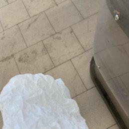 a bag of toilet paper on the floor a bag of toilet paper on the floor
