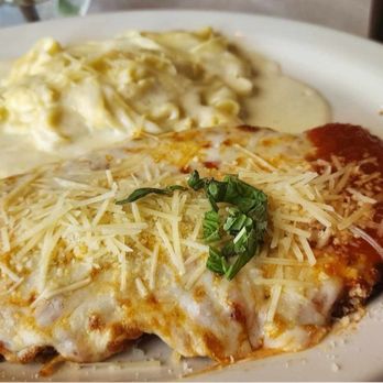 Mangia - Chicken Parmigiana with Fettuccine Alfredo - Italian Near Me - Orlando, Florida Mangia - Chicken Parmigiana with Fettuccine Alfredo - Italian Near Me - Orlando, Florida