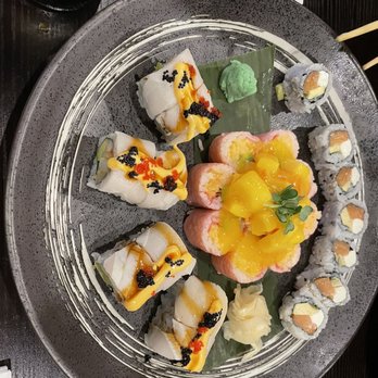 Mido Sushi Bistro & Bar - Snow White Roll, sexy lady roll in the middle, and Philly roll - Sushi Bars Near Me - Norwich, Connecticut Mido Sushi Bistro & Bar - Snow White Roll, sexy lady roll in the middle, and Philly roll - Sushi Bars Near Me - Norwich, Connecticut