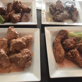 Marley's Gotham Grill - Wings! Truffle parmesan, spicy blue cheese, salt and vinegar, and thai peanut - Bars Near Me - Hackettstown, New Jersey Marley's Gotham Grill - Wings! Truffle parmesan, spicy blue cheese, salt and vinegar, and thai peanut - Bars Near Me - Hackettstown, New Jersey