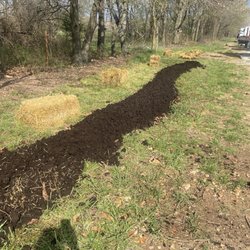 J-M Farms Inc - Mushroom compost on top of cardboard with leaves underneath base layer from my lasagna gardening.