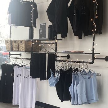 Strong Pilates - retail rack - Fitness & Instruction Near Me - Williston Park, New York Strong Pilates - retail rack - Fitness & Instruction Near Me - Williston Park, New York