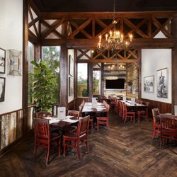 Dons Seafood - Lafayette - A bright, timber-framed private dining space in Lafayette, arranged with long tables ready for groups.
