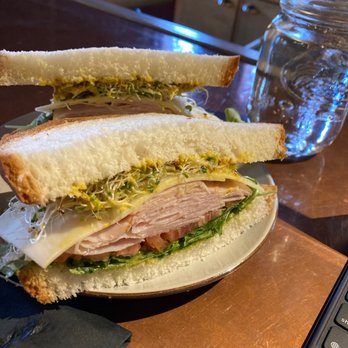 Bar1911 - Turkey sandwich ~$12 after tax with thick bread, sprouts, Tomato, lettuce, avocado spread, Dijon, cheese - Beer Bar Near Me - Charlottetown, Prince Edward Island