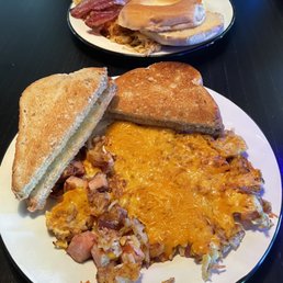 two plates of breakfast food two plates of breakfast food