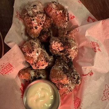 Atomic Cowboy - Dessert pastries sprinkled with crushed Oreos and served with a dipping frosting. - Cocktail Bars Near Me - Golden, Colorado