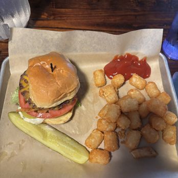 The River Burger Bar - The Waynesburger with cheddar cheese, tater tots, and a pickle. - Burgers Near Me - Waynesboro, Virginia The River Burger Bar - The Waynesburger with cheddar cheese, tater tots, and a pickle. - Burgers Near Me - Waynesboro, Virginia