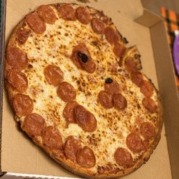 Special jack-o-latern Halloween pizza