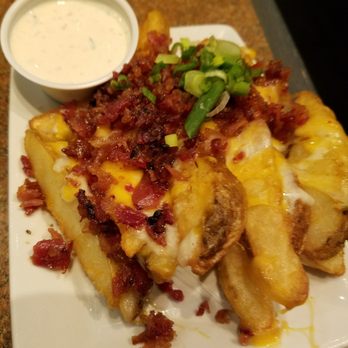 Silver Gulch Brewing & Bottling - Loaded Potato wedges. Pricey for the amount. - American Near Me - Anchorage, Alaska Silver Gulch Brewing & Bottling - Loaded Potato wedges. Pricey for the amount. - American Near Me - Anchorage, Alaska