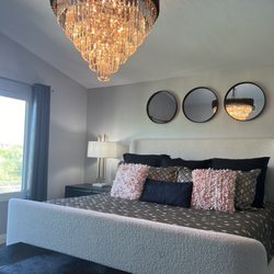 Extravagance Design & Home Furnishings - Textures!! Bed, stool, chandelier