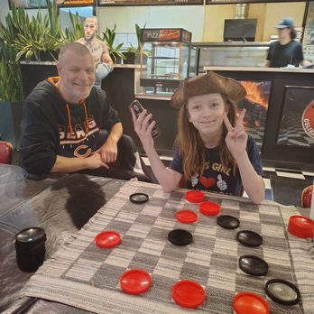 Frato's Culinary Kitchen - Playing checkers while waiting for our pizza - Burgers Near Me - Schaumburg, Illinois Frato's Culinary Kitchen - Playing checkers while waiting for our pizza - Burgers Near Me - Schaumburg, Illinois