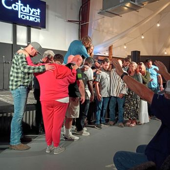 Catalyst Church - This is where the congregation is praying over the New Deacon - Churches Near Me - Panama City, Florida Catalyst Church - This is where the congregation is praying over the New Deacon - Churches Near Me - Panama City, Florida
