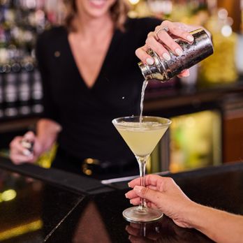 The Capital Grille - Freshly sliced Dole pineapple and precisely infused vodka make up our signature martini, the Doli. - Steakhouses Near Me - Dallas, Texas