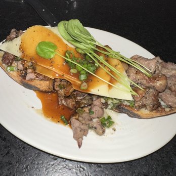 Red Ash - Bruschetta Of Wood Roasted Dry Aged Steak Trimmings - Italian Near Me - Austin, Texas Red Ash - Bruschetta Of Wood Roasted Dry Aged Steak Trimmings - Italian Near Me - Austin, Texas