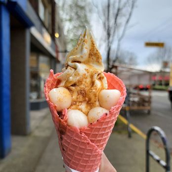 Indigo Cow - Hokkaido milk soft serve with shiratama kuromitsu kinako topping in a waffle cone. $9.50+tax! Instagram: @eatingwiththao - Ice Cream & Frozen Yogurt Near Me - Seattle, Washington Indigo Cow - Hokkaido milk soft serve with shiratama kuromitsu kinako topping in a waffle cone. $9.50+tax! Instagram: @eatingwiththao - Ice Cream & Frozen Yogurt Near Me - Seattle, Washington