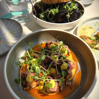 Fishbone By The Lake - PEI mussel (top), grilled octopus (bottom) - Portuguese Near Me - Stouffville, Ontario Fishbone By The Lake - PEI mussel (top), grilled octopus (bottom) - Portuguese Near Me - Stouffville, Ontario