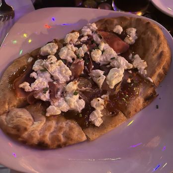 Kilted Mermaid - Fig, goat cheese and prosciutto flatbread. - Bars Near Me - Vero Beach, Florida Kilted Mermaid - Fig, goat cheese and prosciutto flatbread. - Bars Near Me - Vero Beach, Florida