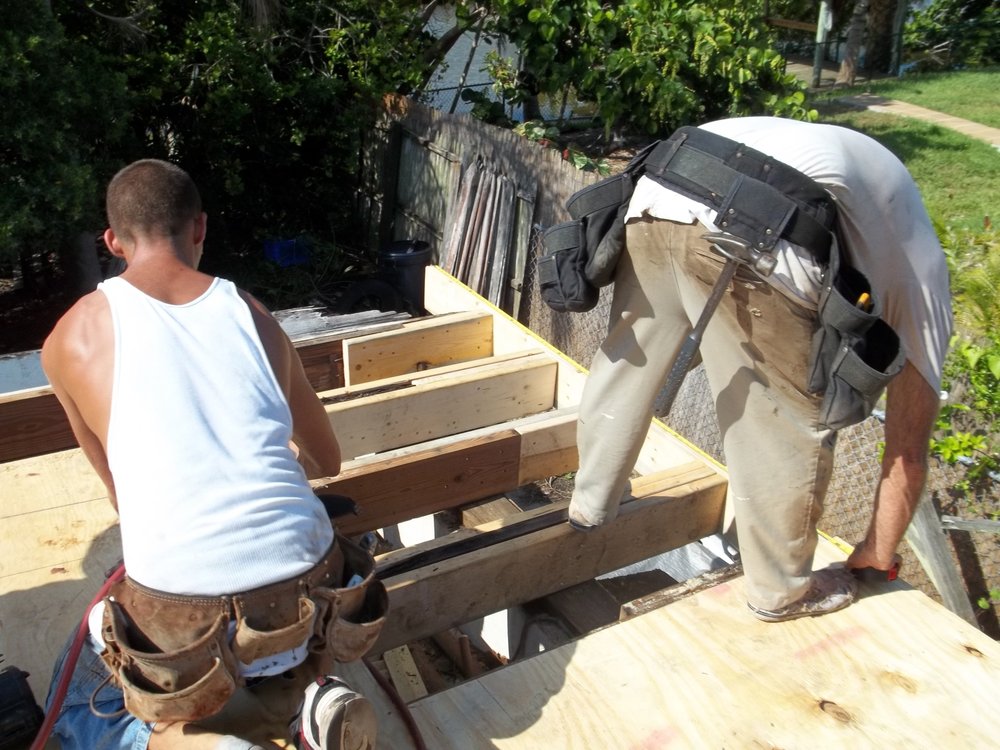 Slide of J K Behan Roofing