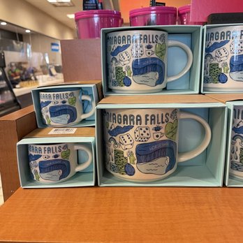 Starbucks - a stack of starbucks coffee mugs - Coffee & Tea Near Me - Ruby, New York