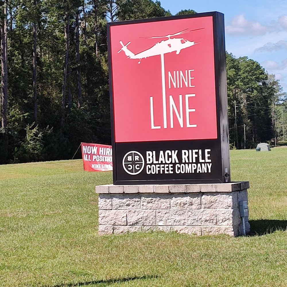Nine Line Foundation - Close up of main sign - Coffee & Tea Near Me - Savannah, Georgia Nine Line Foundation - Close up of main sign - Coffee & Tea Near Me - Savannah, Georgia