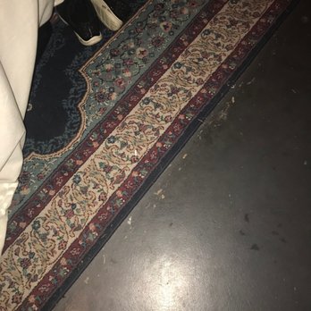Massage Kneaded - scum and other grime on the floors and another picture of massage persons shoes. So inappropriate. - Massage Therapy Near Me - Lakewood, Washington