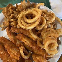 Mulligan's - Buffalo tenders and curly fries. Still the best deal in town.