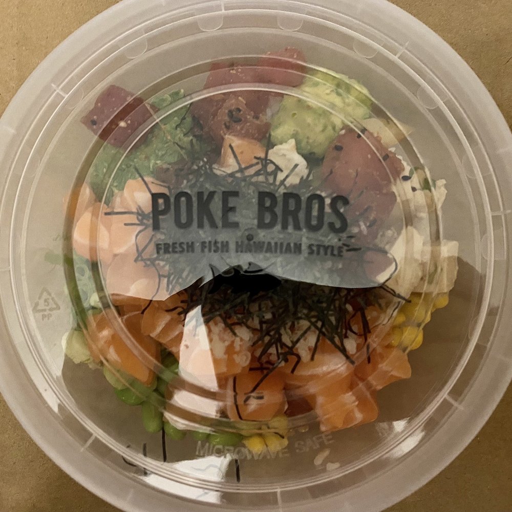 Half and half poke bowl to go - with salmon and marinated tuna Half and half poke bowl to go - with salmon and marinated tuna
