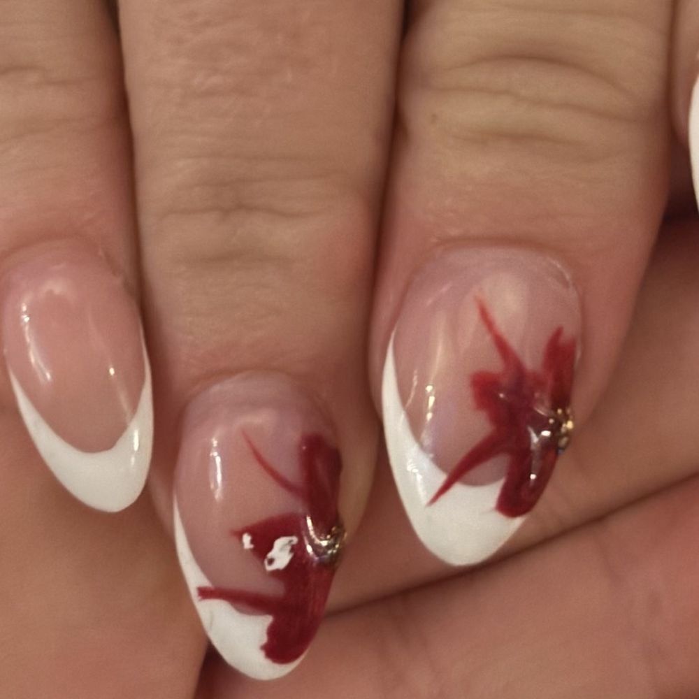 Sunflower Nails and Spa - I asked for a red flower, This looks like a blood clot coming out of my vagina. Dont GO HERE. - Nail Salons Near Me - Escondido, California