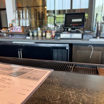 Iron Hill Brewery TapHouse - a menu on the bar - Breweries Near Me - Exton, Pennsylvania