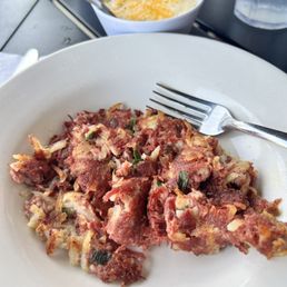 Scrumptious corned beef hash & tasty cheesy grits. Scrumptious corned beef hash & tasty cheesy grits.