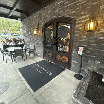 Delaney's Tavern - I love the stones entrance way with the big iron doors! It's a very beautiful restaurant. - New American Near Me - Orlando, Florida Delaney's Tavern - I love the stones entrance way with the big iron doors! It's a very beautiful restaurant. - New American Near Me - Orlando, Florida
