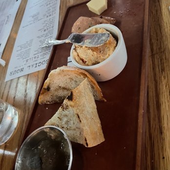 Whiskey Cake Kitchen & Bar - Mini board- after someone had started eating some. Banana purée, pimento cheese, bread, and sausage. - New American Near Me - Katy, Texas Whiskey Cake Kitchen & Bar - Mini board- after someone had started eating some. Banana purée, pimento cheese, bread, and sausage. - New American Near Me - Katy, Texas