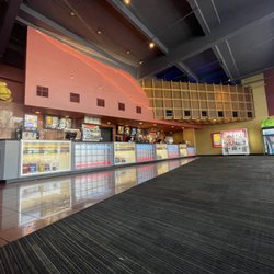Front lobby with concessions.  Clean.  Brightly decorated.  Lots of space.