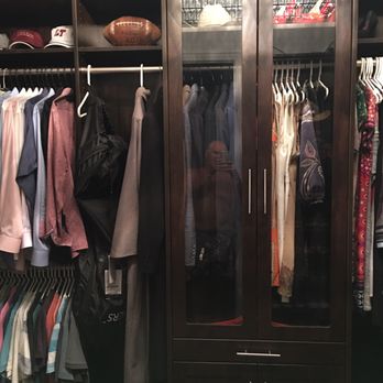 Closets by Design - Austin - The glass doors are elegant without sacrificing space or adding a huge cost. - Home Organization Near Me - Austin, Texas Closets by Design - Austin - The glass doors are elegant without sacrificing space or adding a huge cost. - Home Organization Near Me - Austin, Texas
