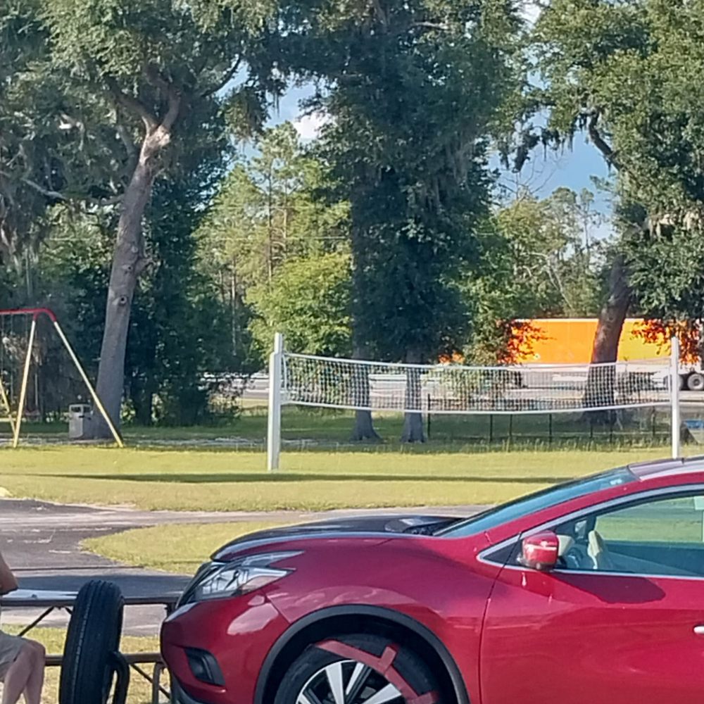 Palms & Pines Campground & RV Park - Volleyball and partial playground photo from my RV - Campgrounds Near Me - Jennings, Florida Palms & Pines Campground & RV Park - Volleyball and partial playground photo from my RV - Campgrounds Near Me - Jennings, Florida
