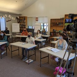 Junior Values in World Thought students interviewing Maria Pacheco, founder of the Wakami system.