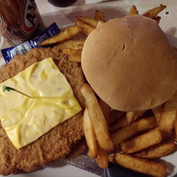 Laddy's Bar & Grill - Pork tenderloin uncovered - Sandwiches Near Me - Chester, Iowa Laddy's Bar & Grill - Pork tenderloin uncovered - Sandwiches Near Me - Chester, Iowa