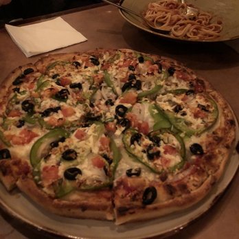 Minerva Restaurant - Medium Greek with added garlic and olives - Pizza Near Me - Vancouver, British Columbia Minerva Restaurant - Medium Greek with added garlic and olives - Pizza Near Me - Vancouver, British Columbia